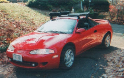 Mitsubishi Eclipse - fast, handles, fire-engine red, mint condition...